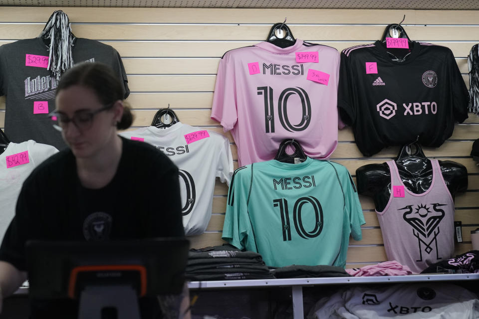 Jerseys with Inter Miami forward Lionel Messi name and number on them are shown for sale before the start of an MLS soccer match between Inter Miami and Toronto FC, Wednesday, Sept. 20, 2023, in Fort Lauderdale, Fla. Regarded as one of the best players in the world, Messi already has the league's best-selling jersey (AP Photo/Wilfredo Lee)