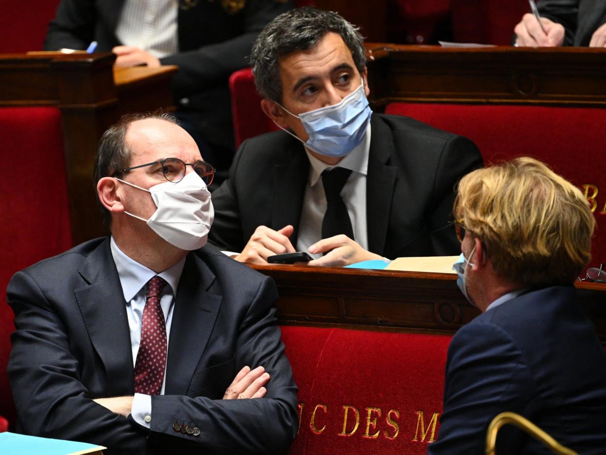 Jean Castex et Gérald Darmanin à l'Assemblée nationale le 24 novembre 2020.
 - Anne-Christine POUJOULAT / AFP