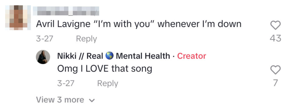 Two users' comments on a social media post discussing a song by Avril Lavigne