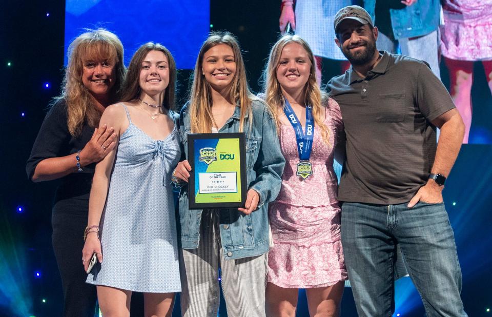 Players and coaches from the Algonquin girls' hockey team took the stage to accept the award for the Hometeam Team of the Year as the top student-athletes in Central Massachusetts were honored Wednesday night at the Hanover Theatre at the Central Mass. High School Sports Awards ceremony.