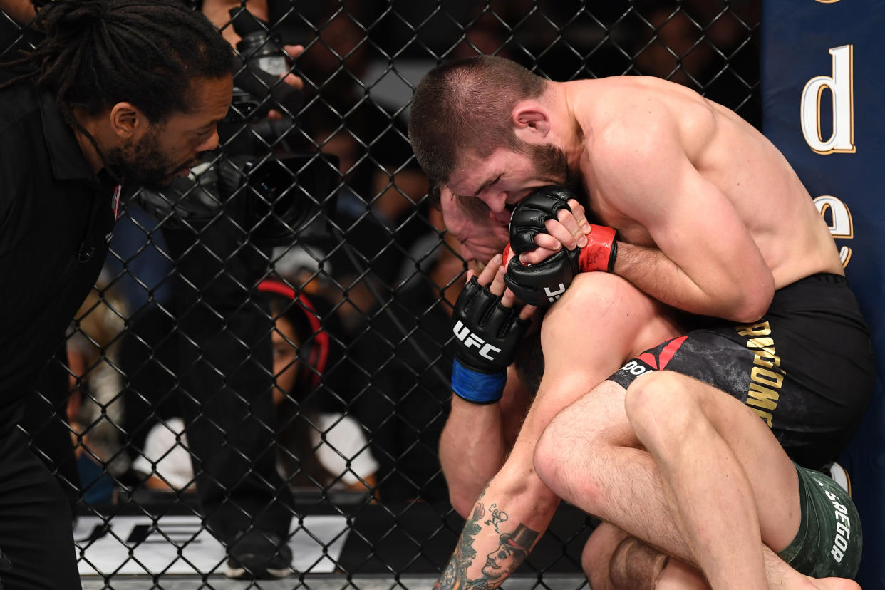 Khabib Nurmagomedov submits Conor McGregor in their lightweight championship bout at UFC 229 inside T-Mobile Arena on Oct. 6, 2018 in Las Vegas. (Getty Images)