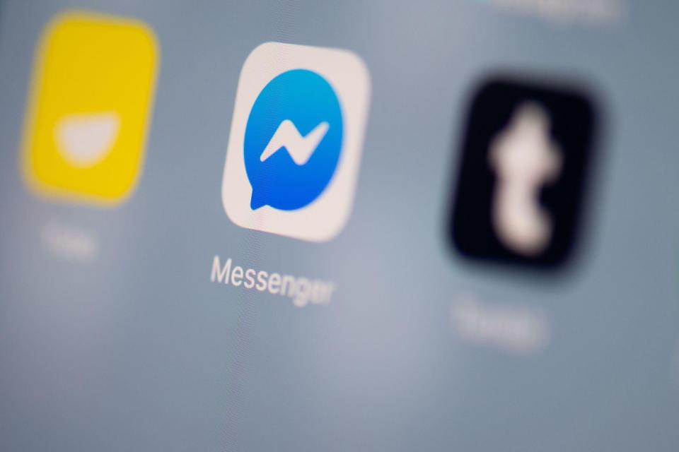 This illustration picture taken on July 24, 2019 in Paris shows the logo of the instant messaging application of Facebook called Messenger on the screen of a tablet: MARTIN BUREAU/AFP via Getty Images