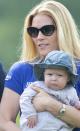 <p>Mia Tindall is held by mom Zara Phillips’ sister-in-law, Autumn Phillips, during the Mike Tindall Celebrity Golf Classic at the Celtic Manor Resort of Newport, Wales in May 2014. Just look at that little pouty face!</p>