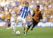 Britain Soccer Football - Hull City v Sheffield Wednesday - Sky Bet Football League Championship Play-Off Final - Wembley Stadium - 28/5/16 Sheffield Wednesday's Sam Hutchinson in action with Hull City's Curtis Davies Action Images via Reuters / Andrew Couldridge Livepic EDITORIAL USE ONLY. No use with unauthorized audio, video, data, fixture lists, club/league logos or "live" services. Online in-match use limited to 45 images, no video emulation. No use in betting, games or single club/league/player publications. Please contact your account representative for further details.