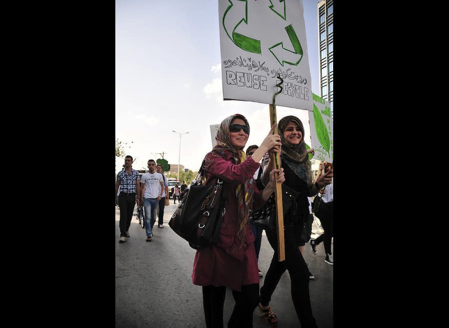 More than 200 hundred men, women and children rode bicycles, picked up trash  from the street and informed Iraqi citizens about the importance of  environmental protection