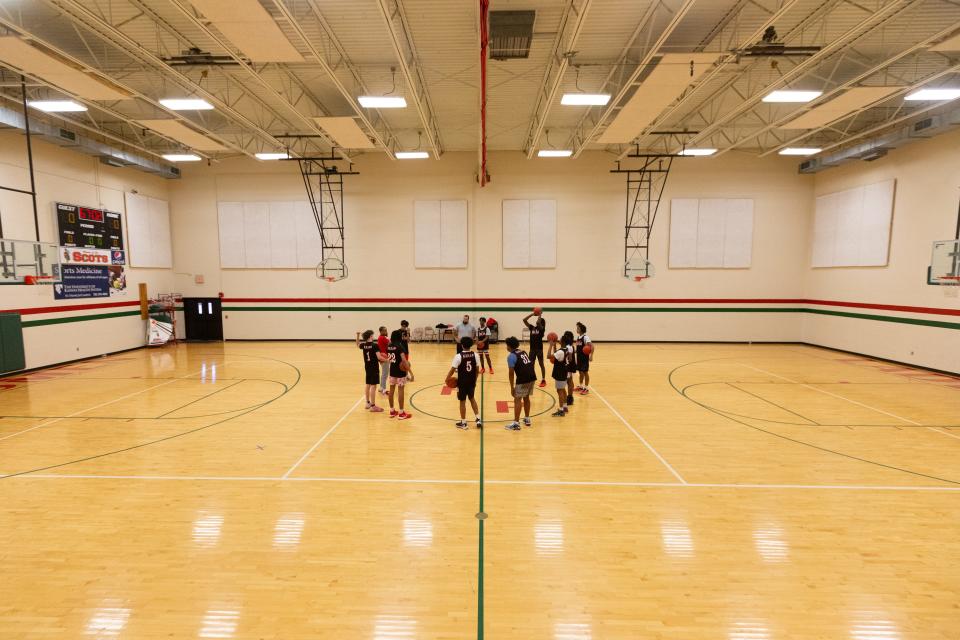 The tight quarters in the south gymnasium at Highland Park High School have created a unique feeling for the boys varsity basketball team as they go over the drills for practice Feb. 6.