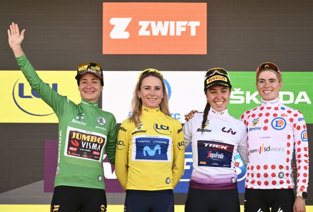  Marianne Vos wearing the sprinters green jersey, Annemiek Van Vleuten wearing the overall leader's yellow jersey, Shirin Van Anrooij wearing the best young riders white jersey, and Demi Vollering wearing the climbers dotted jersey celebrate on the podium after the 8th and final stage of the new edition of the Women's Tour de France  