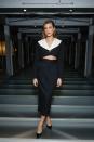 <p>The model looked like she'd stepped out from the scene of a Golden Hollywood film at the ELLE's Women in Hollywood event on October 19. The model wore a collared Miu Miu cutout dress for the event, styled with hoop earrings and black pointed-toe stilettos.</p><p><a class="link " href="https://www.selfridges.com/GB/en/cat/amina-muaddi-x-wolford-cut-out-stretch-jersey-midi-dress_R03802240/" rel="nofollow noopener" target="_blank" data-ylk="slk:SHOP BLACK CUTOUT DRESS;elm:context_link;itc:0;sec:content-canvas">SHOP BLACK CUTOUT DRESS</a></p>