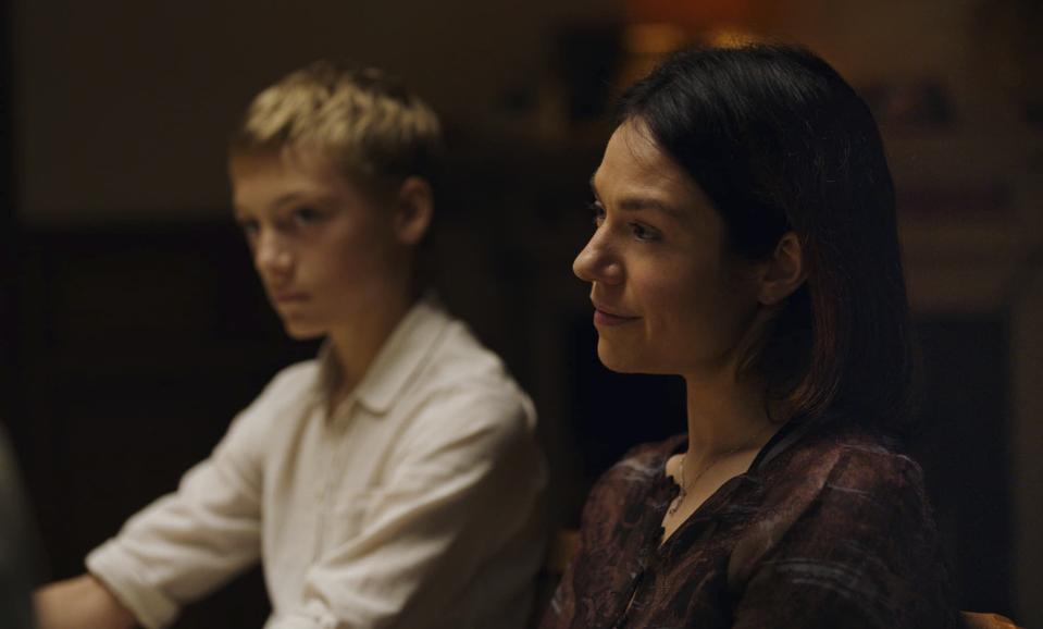 This image released by A24 shows Eden Dambrine, left, and Émilie Dequenne in a scene from "Close." (A24 via AP)