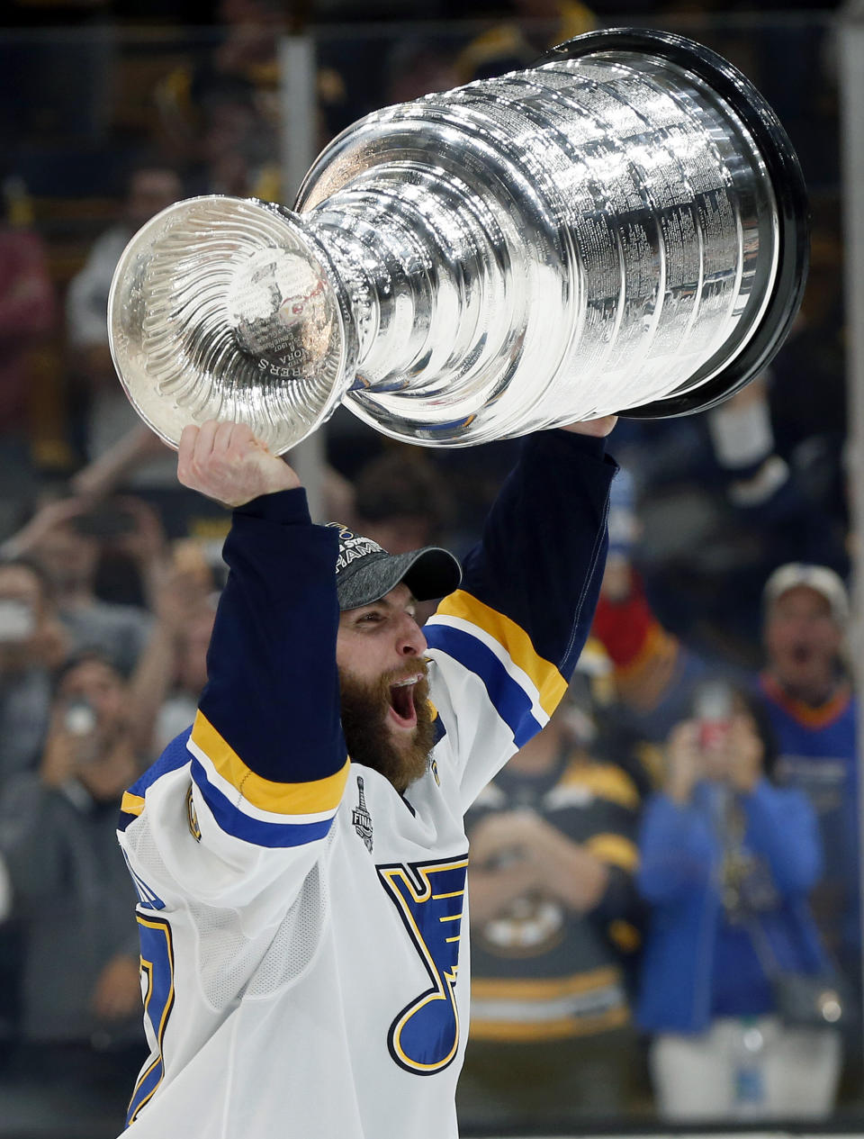 St. Louis Blues' Alex Pietrangelo carries the Stanley Cup after the Blues defeated the Boston Bruins in Game 7 of the NHL Stanley Cup Final, Wednesday, June 12, 2019, in Boston. (AP Photo/Michael Dwyer)