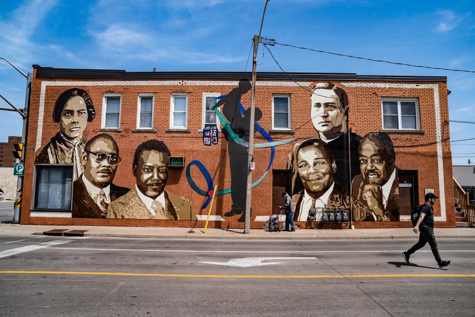 The 'Reaching Out' mural celebrates the Black community including Mary Ann Shadd Cary (1823-1893), in the upper left corner, who was an abolitionist and women's rights activist, photographed in Windsor, Tuesday, May 10, 2022 . Mary Ann Shad Cary will be memorialized in a sculpture and unveiled Thursday.