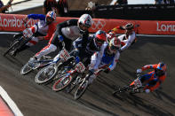 LONDON, ENGLAND - AUGUST 09: Connor Fields of the United States (2L) leads the field out of the berm during the Men's BMX Cycling Quarter Finals on Day 13 of the London 2012 Olympic Games at BMX Track on August 9, 2012 in London, England. (Photo by Phil Walter/Getty Images)