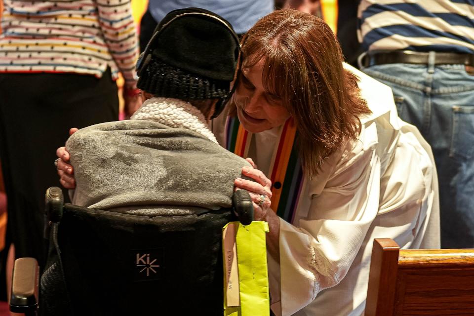 Pastor Tracy Beadle talks to a congregation member during a Sunday service at Westlake United Methodist Church on Sunday, May 5, 2024.