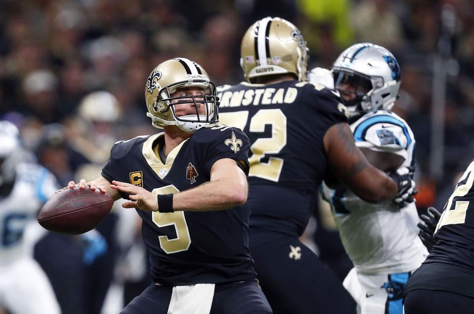 Drew Brees completed a trifecta sweep of the Panthers on Sunday. (AP) 