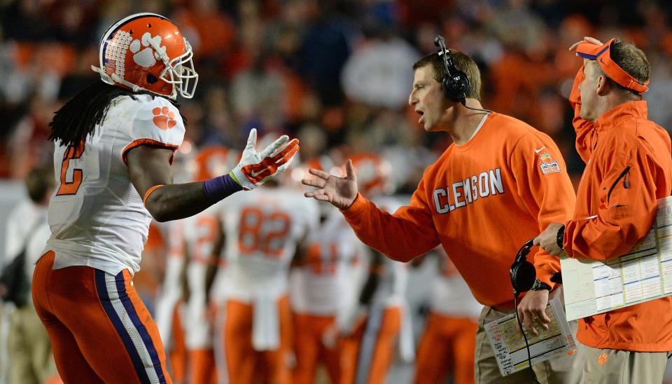 Clemson wide receiver Sammy Watkins (2) and head coach Dabo Swinney during the 4th quarter of the Discover Orange Bowl at Sun Life Stadium in Miami Friday, Jan. 3, 2014. BART BOATWRIGHT/Staff