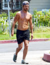 <p>Derek Hough soaks up some sunshine on a shirtless jog in L.A. on Sunday.</p>