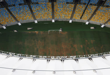 An aerial view of Maracana Stadium, which was used for the Opening and Closing ceremonies of the Rio 2016 Olympic Games, shows the turf being dry, worn and filled with ruts and holes, in Rio de Janeiro, Brazil January 12, 2017. Picture taken on January 12, 2017. REUTERS/Nacho Doce