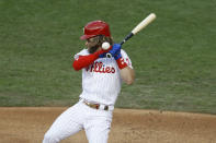 Philadelphia Phillies' Bryce Harper is hit by a pitch from Atlanta Braves' Sean Newcomb during the second inning of a baseball game, Monday, Aug. 10, 2020, in Philadelphia. (AP Photo/Matt Slocum)