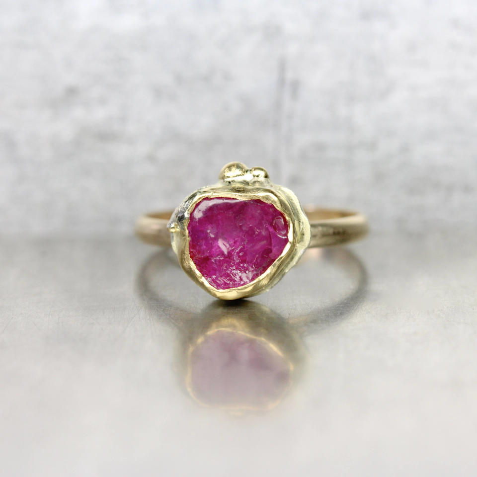 <i>Buy it from&nbsp;<a href="https://www.etsy.com/listing/540086899/raw-cherry-pink-ruby-engagement-ring-22k?ref=shop_home_active_29" target="_blank">NangijalaJewelry via&nbsp;Etsy</a><a href="https://www.etsy.com/listing/524829777/raw-diamond-ring-raw-diamond-engagement" target="_blank">&nbsp;</a>for $598</i>