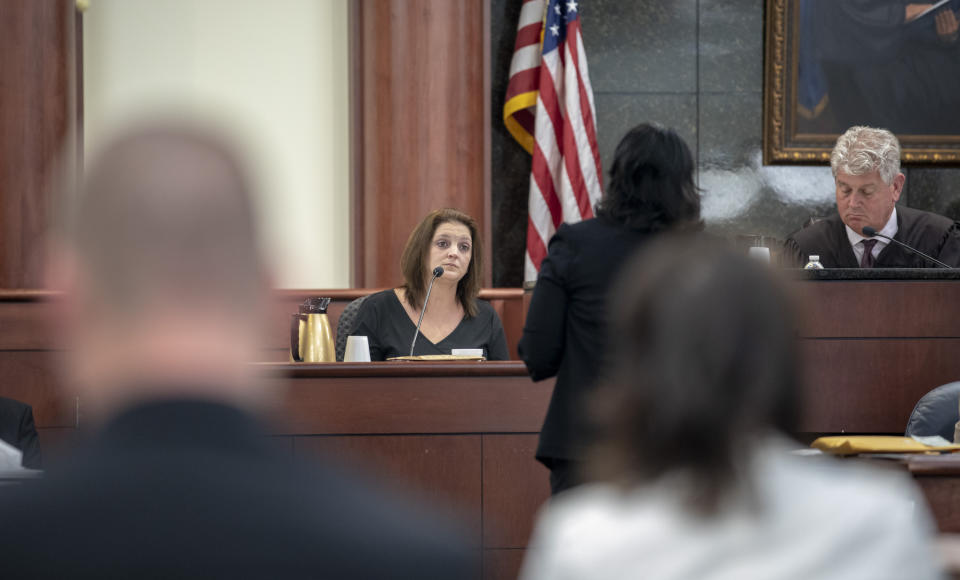 CORRECTS TOWN TO COLUMBIA NOT LEXINGTON - Tim Jones' ex-wife Amber Kyzer is questioned by 11th Circuit deputy solicitor Suzanne Mayes, during the trial of her ex-husband, Tim Jones, in Columbia, S.C., Monday, May 20, 2019. Timothy Jones, Jr. is accused of killing their 5 young children in 2014. Jones, who faces the death penalty, has pleaded not guilty by reason of insanity. (Tracy Glantz/The State via AP, Pool)
