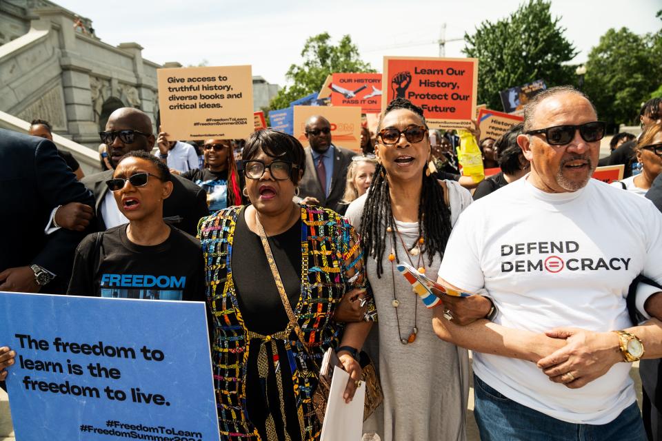 Leaders of national civil rights organizations and scholars joined protesters during a march to the U.S. Supreme Court in Washington, D.C., May 3, 2024 to rally against efforts to ban books and restrict black history education.
