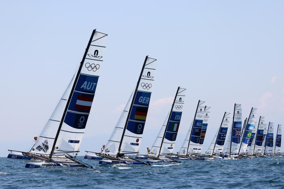 <p>FUJISAWA, JAPAN - AUGUST 01: The Nacra 17 Foiling class head out to compete on day nine of the Tokyo 2020 Olympic Games at Enoshima Yacht Harbour on August 01, 2021 in Fujisawa, Kanagawa, Japan. (Photo by Phil Walter/Getty Images)</p> 