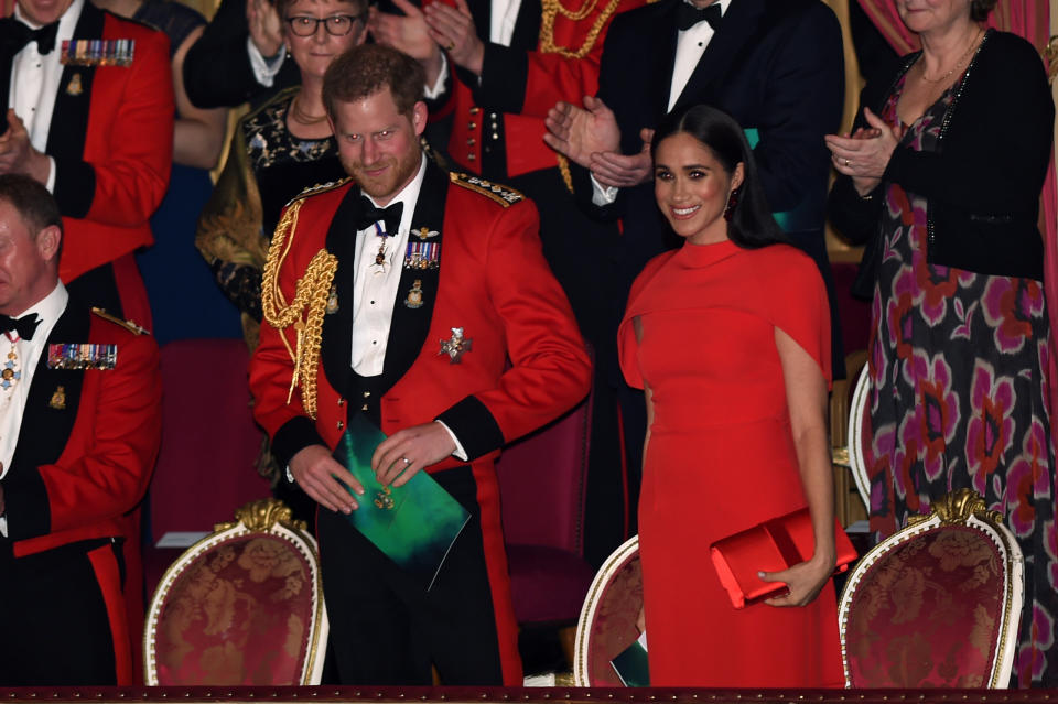 Britain's Prince Harry and his wife Meghan attend the Mountbatten Festival of Music at the Royal Albert Hall in London, Britain March 7, 2020. Eddie Mulholland/Pool via REUTERS