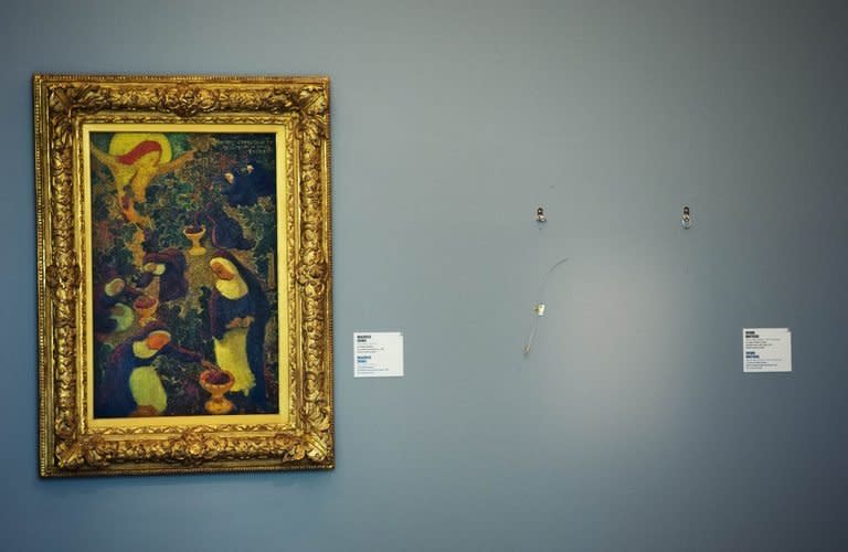 An empty spot stands on October 16, 2012, at the Kunsthal Museum in Rotterdam, where a painting by French artist Henri Matisse was stolen. Romanian police investigating the spectacular October theft of seven masterpieces from the Rotterdam museum searched the home of a fashion designer on Monday, a police source said