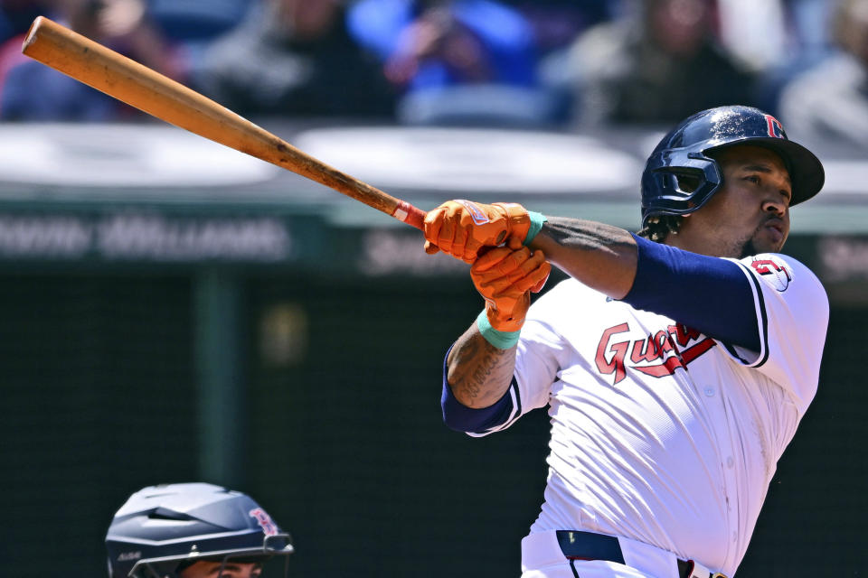 Cleveland Guardians' Jose Ramirez watches the ball after hitting a grand slam off Boston Red Sox starting pitcher Chase Anderson during the second inning of a baseball game, Thursday, April 25, 2024, in Cleveland. (AP Photo/David Dermer)