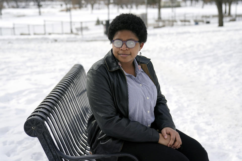 Licensed social worker Deana Ayers poses Jan. 11, 2021 in Minneapolis. Ayers said collaboration between police and social workers risks perpetuating the systemic racism she has seen in the social work field. "Putting social workers in to heal all the wounds as a Band-Aid is just going to blow up in everyone's face," she said. (AP Photo/Jim Mone)