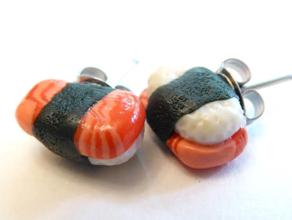 Salmon Sushi Earrings&nbsp;<br />$15.00, Etsy. Buy it <a href="https://www.etsy.com/listing/280828198/salmon-sushi-earrings-sake-nigiri?ga_order=most_relevant&amp;ga_search_type=all&amp;ga_view_type=gallery&amp;ga_search_query=sake%20earrings&amp;ref=sr_gallery_2" target="_blank">here.</a>