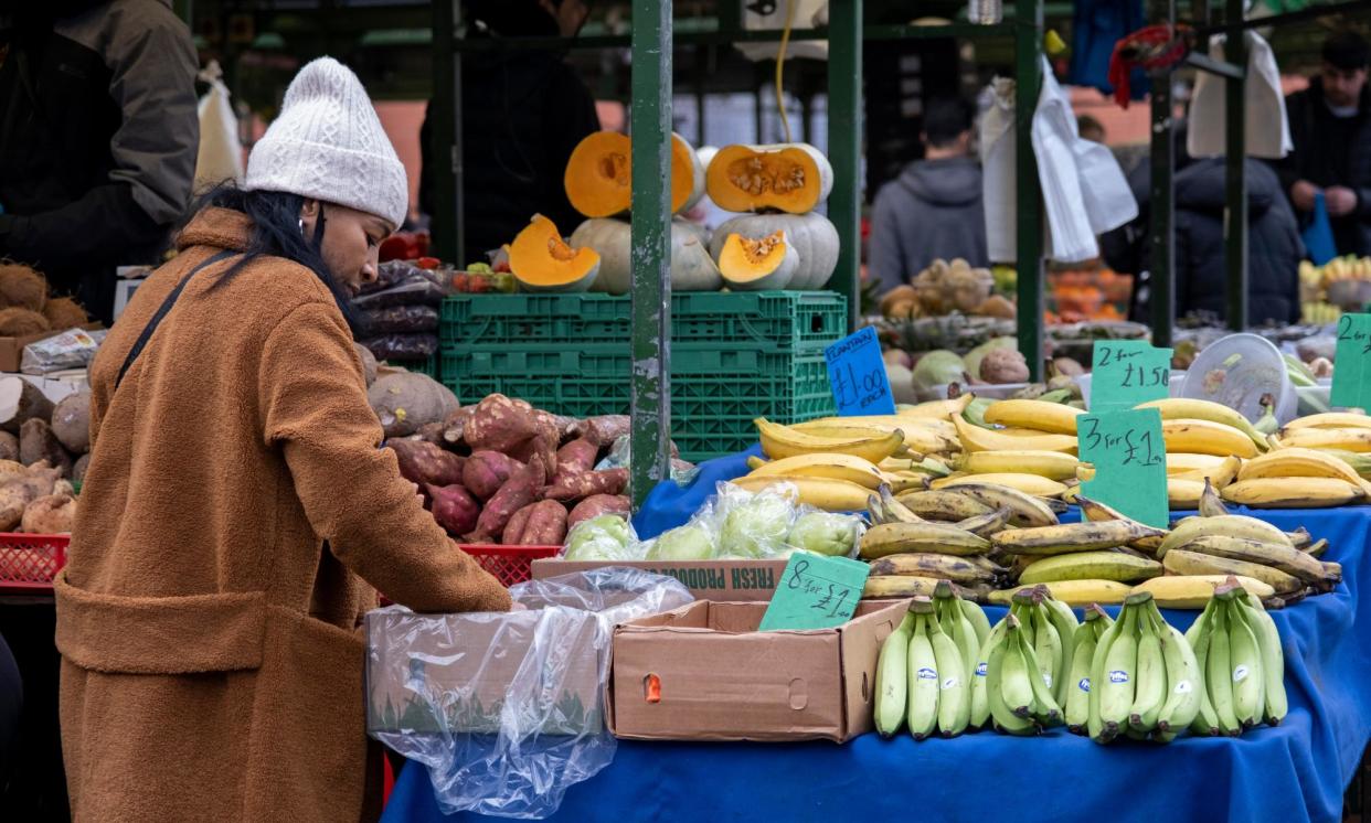 <span>Shoppers in Birmingham Open Market. Many in the city fear for the future.</span><span>Photograph: Mike Kemp/In Pictures/Getty Images</span>