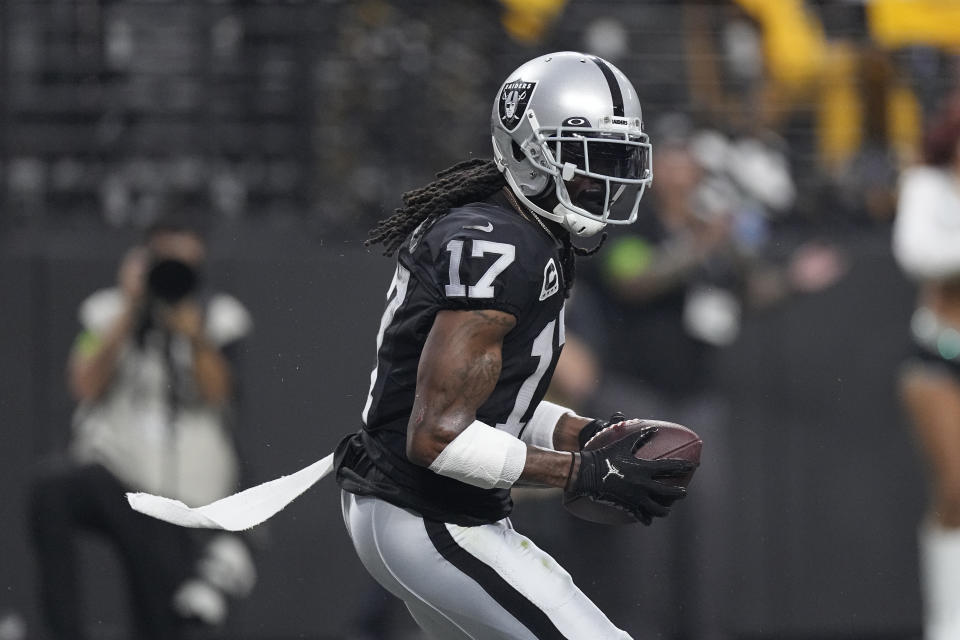 Las Vegas Raiders wide receiver Davante Adams catches a touchdown during the first half of an NFL football game against the Pittsburgh Steelers Sunday, Sept. 24, 2023, in Las Vegas. (AP Photo/Mark J. Terrill)