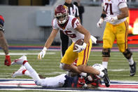 Southern California wide receiver Drake London (15) tries to get away from Arizona defensive back Quinn Sullivan (30) after a catch during the second half of an NCAA college football game Saturday, Nov. 14, 2020, in Tucson, Ariz. Southern California won 34-30. (AP Photo/Rick Scuteri)