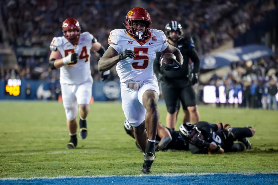 Iowa State Cyclones running back Cartevious Norton (5) runs the ball in for a touchdown, putting the Cyclones up 24-7 after the PAT, in the game against the BYU Cougars at LaVell Edwards Stadium in Provo on Saturday, Nov. 11, 2023. | Spenser Heaps, Deseret News