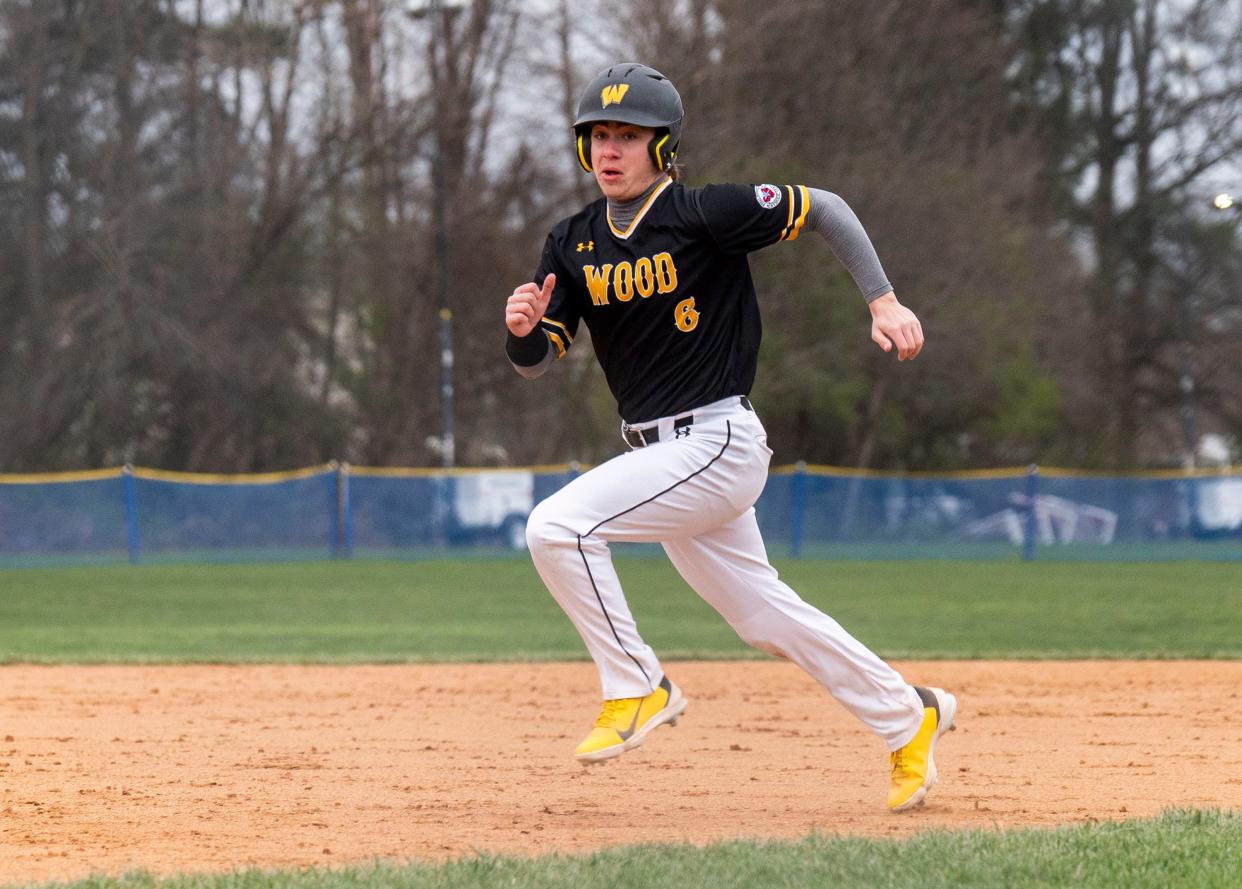 Archbishop Wood's Brady Sell (6) runs toward third base against Holy Ghost Prep during their non-league baseball game in Bensalem on Friday, March 22, 2024.