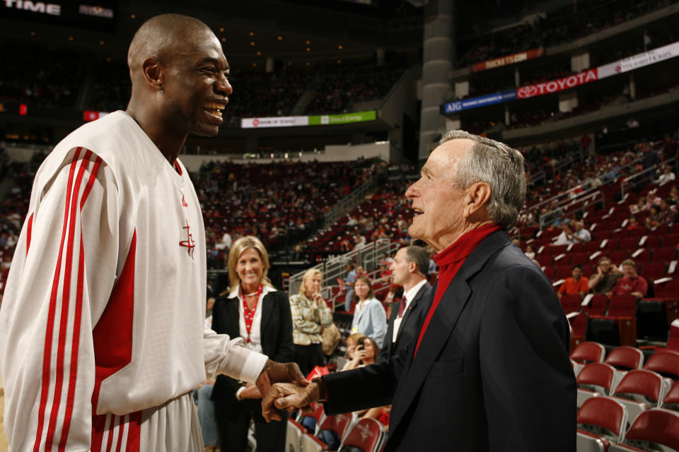 Former President George H.W. Bush is a longtime Houston Rockets fan. Just ask Dikembe Mutombo. (Getty Images)