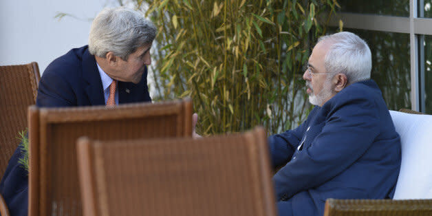 U.S. Secretary of State John Kerry, left, talks with Iranian Foreign Minister Mohammad Javad Zarif, in Geneva, Switzerland, Saturday, May 30, 2015.  Top U.S. and Iranian diplomats are gathering in Geneva this weekend, hoping to bridge differences over a nuclear inspection accord and economic sanctions on Tehran. (AP Photo/Susan Walsh, Pool) (Photo: )