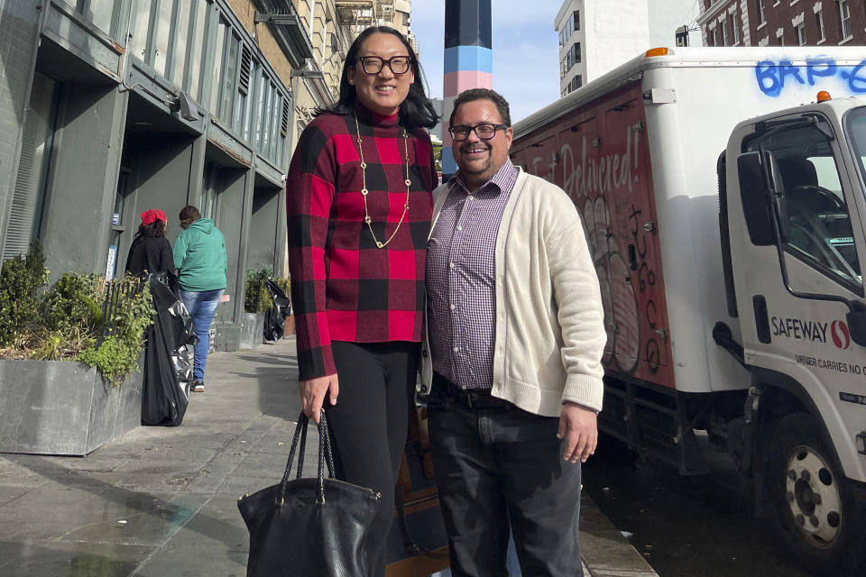 In this photo provided by the National Center for Transgender Equality, Andy Marra, left, the executive director of the Transgender Legal Defense and Education Fund, and Rodrigo Heng-Lehtinen, executive director of the National Center for Transgender Equality visit San Francisco's Transgender District in January 2023. In the summer of 2024, their organizations – two of the biggest transgender-rights groups in the U.S. – will merge into a new organization to be called Advocates for Trans Equality. (NCTE via AP)