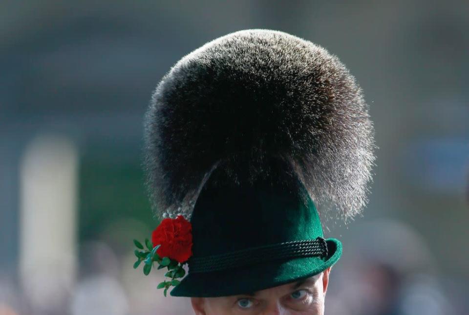 A member of a riflemen's association wears a traditional Bavarian Gamsbart hat during the riflemen's parade on the second day of the Oktoberfest.