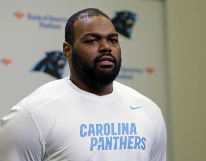 Carolina Panthers&#39; Michael Oher speaks to the media during the first day of their NFL football offseason conditioning program, Monday, April 20, 2015, in Charlotte, N.C. (AP Photo/Chuck Burton)