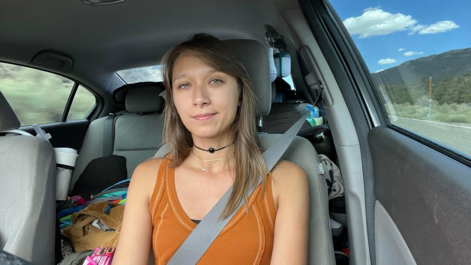 Nikita Crump inside the Honda Civic she has lived in for over a thousand days.