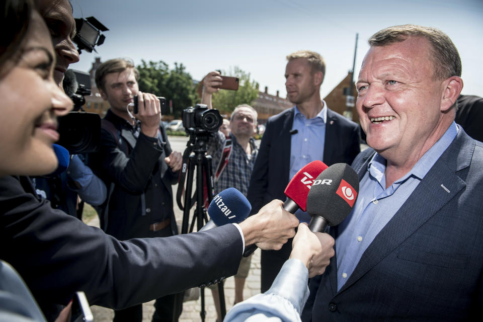 Danish Prime Minister Lars Loekke Rasmussen from the Liberal Party speaks to journalists outside his local polling station in Copenhagen, Denmark, during the parliamentary elections on Wednesday June 5, 2019. (Mads Claus Rasmussen/Ritzau Scanpix via AP)