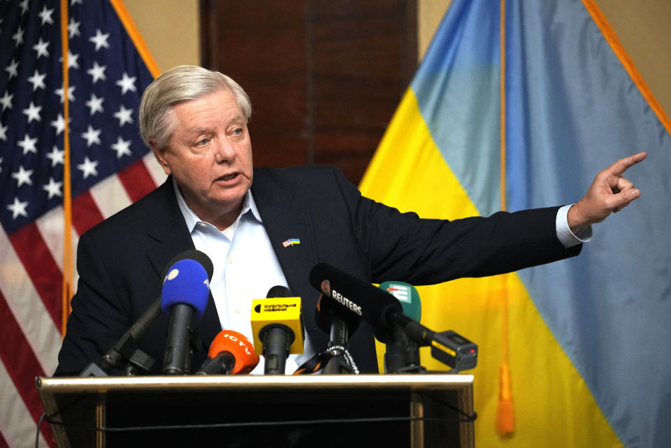 U.S. Sen. Lindsey Graham, R-S.C., gestures as she speaks to the media in Kyiv, Ukraine, Monday, March 18, 2024. (AP Photo/Vadim Ghirda)