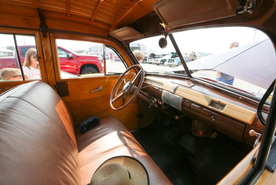 The interior of a 1940s Ford Woodie station wagon on display at Wings and Wheels in Sheboygan Falls, Wisconsin in June.