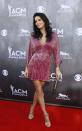 Actress Angie Harmon poses as she arrives at the 49th Annual Academy of Country Music Awards in Las Vegas, Nevada April 6, 2014. REUTERS/Steve Marcus (UNITED STATES - Tags: ENTERTAINMENT) (ACMAWARDS-ARRIVALS)