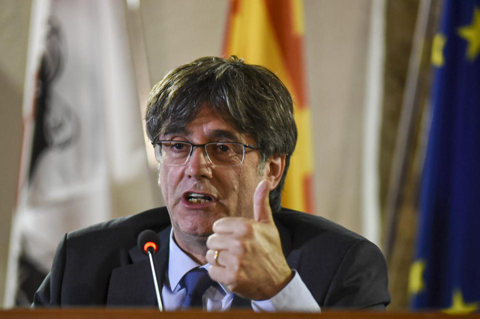 FILE - Catalan leader Carles Puigdemont speaks at a press conference in Alghero, Sardinia, on Oct. 4, 2021. Nearly six years ago, the leader of Catalonia's failed secession bid slipped secretly across the Spanish border to escape arrest and start a life of a self-styled political exile. Now, Carles Puigdemont, after eluding repeated extradition attempts by Spanish justice, has the future of Spain’s government in his hands. (AP Photo/Gloria Calvi, File)