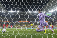 Brazil's Neymar scores his side's second goal from the penalty spot during the World Cup round of 16 soccer match between Brazil and South Korea, at the Education City Stadium in Al Rayyan, Qatar, Monday, Dec. 5, 2022. (AP Photo/Manu Fernandez)