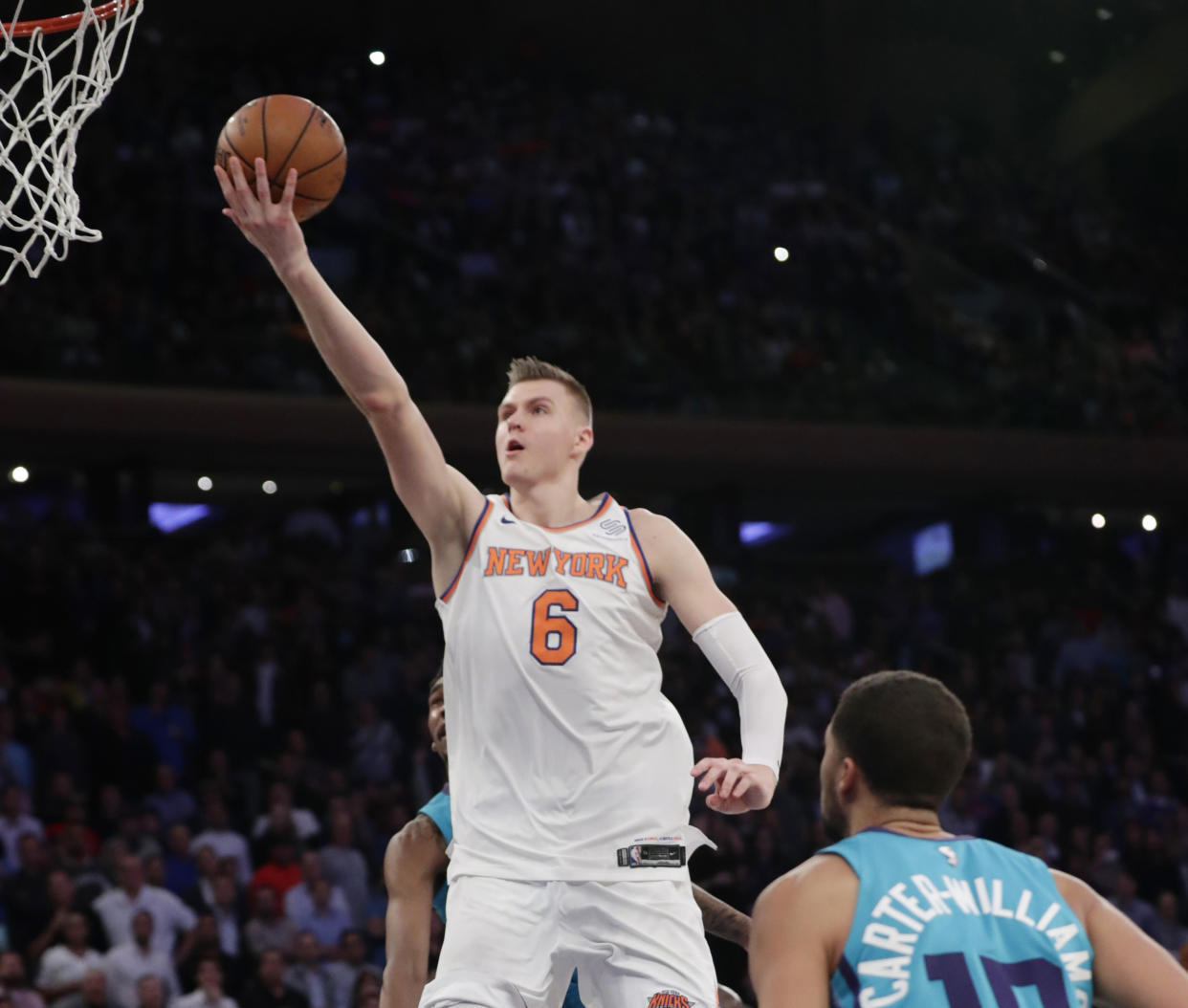 Kristaps Porzingis is driving and thriving, and about a million other things Clyde Frazier says. (AP)