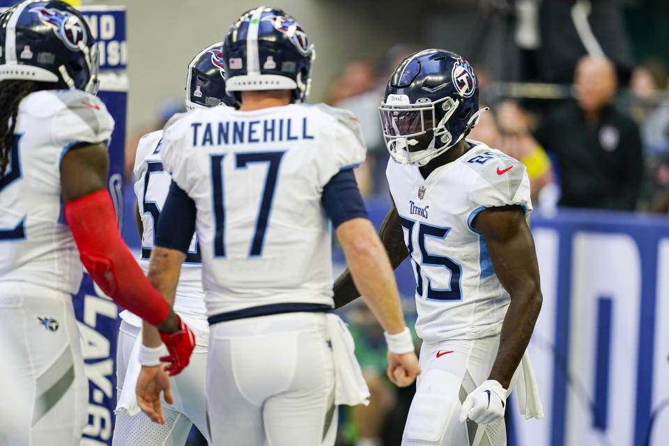 Tennessee Titans tight end Chig Okonkwo (85) celebrates a touchdown catch from quarterback Ryan Tannehill (17) in the first half of an NFL football game against the Indianapolis Colts in Indianapolis, Fla., Sunday, Oct. 2, 2022. (AP Photo/Darron Cummings)